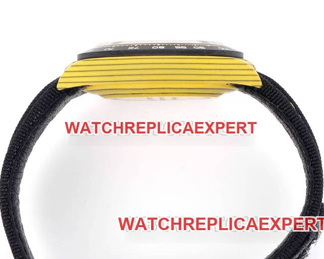 Best replica watches TW factory Rolex Daytona yellow disk yellow case black nylon strap side actual photo