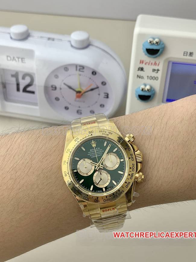 Super clone watch QF factory DaytonaRolexgreen dialyellow gold4131 mechanical wear live photos