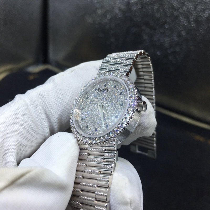 Piaget Jewelry 18K gold starry quartz movement 26mm steel bracelet watch side view