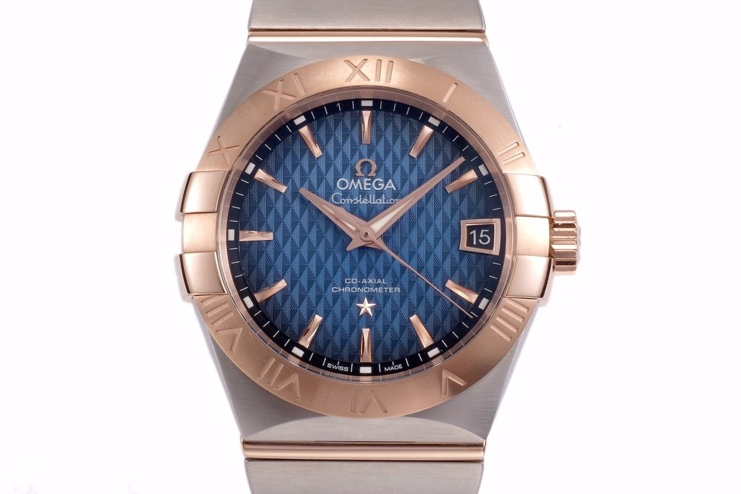 Omega1:1 vs constellation temperament blue dial8500 mechanical watch front view