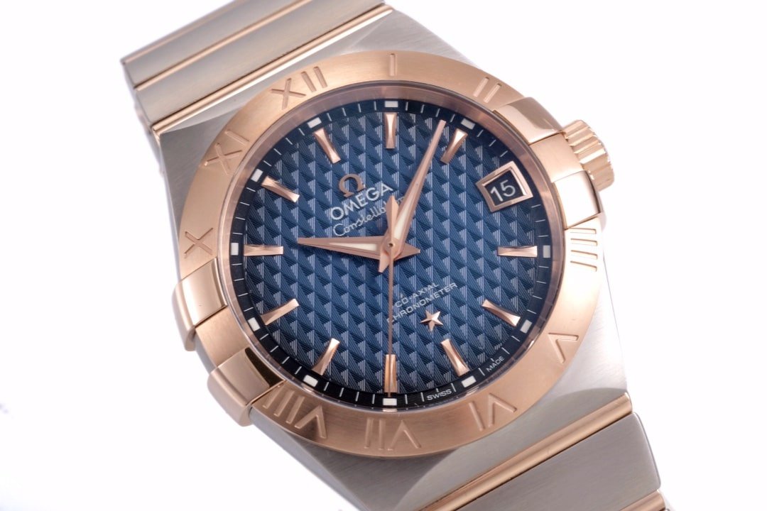 Omega1:1 vs constellation temperament blue dial8500 mechanical watch front view