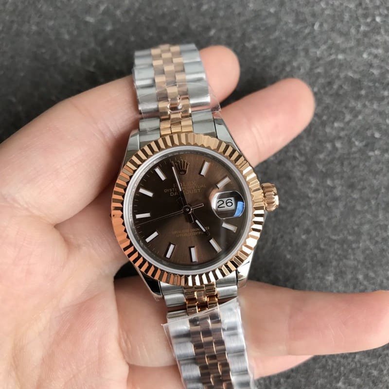Replica Rolex Datejust watch for women, 28mm, mechanical, with a tiger tooth bezel, rose gold case, and coffee-colored dial, front view.