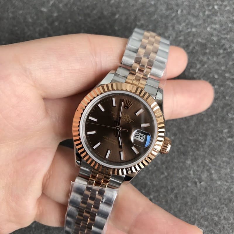Replica Rolex Datejust watch for women, 28mm, mechanical, with a tiger tooth bezel, rose gold case, and coffee-colored dial, front view.
