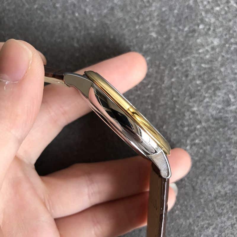 Omegatop-tier replica watch Diefei series men's gold plate leather strap mechanical watch side view