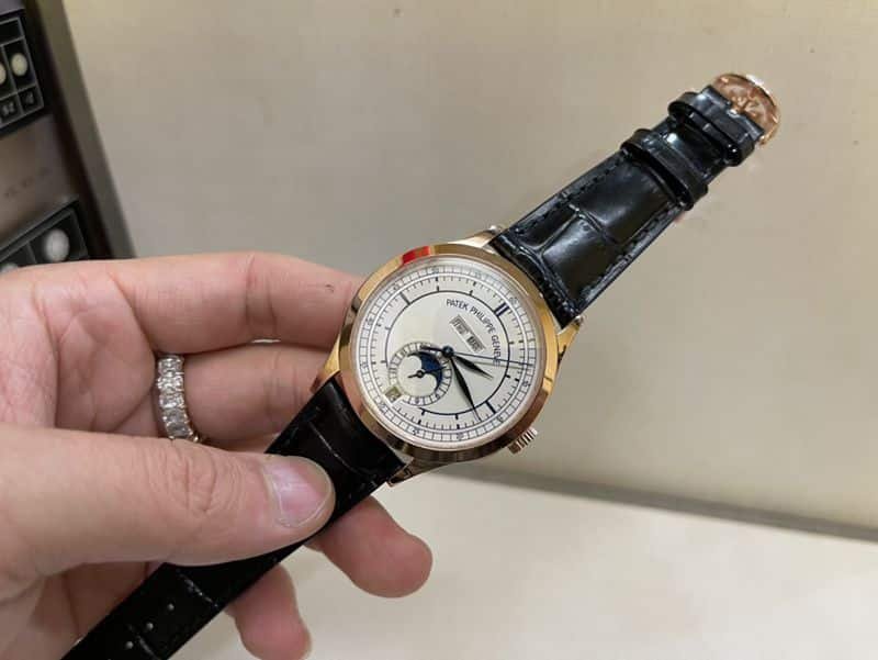 Patek Philippesuper clone watch complex monthly calendar date displayday display series men's leather strap mechanical rose gold watch front view