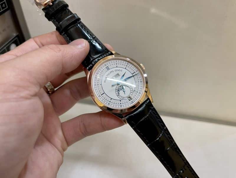 Patek Philippesuper clone watch complex monthly calendar date displayday display series men's leather strap mechanical rose gold watch front view