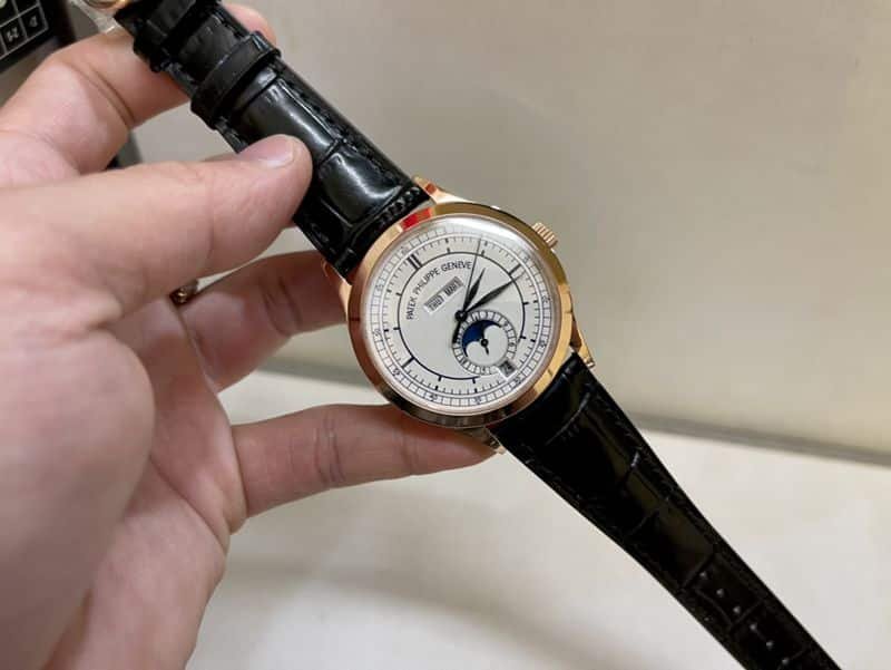 Patek Philippesuper clone watch complex monthly calendar date displayday display series men's leather strap mechanical rose gold watch front view
