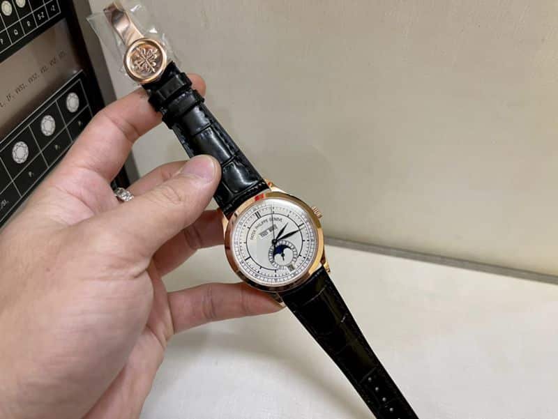 Patek Philippesuper clone watch complex monthly calendar date displayday display series men's leather strap mechanical rose gold watch front view