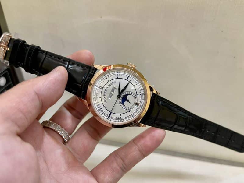 Patek Philippesuper clone watch complex monthly calendar date displayday display series men's leather strap mechanical rose gold watch front view