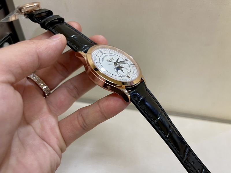 Patek Philippesuper clone watch complex monthly calendar date displayday display series men's leather strap mechanical rose gold watch side view