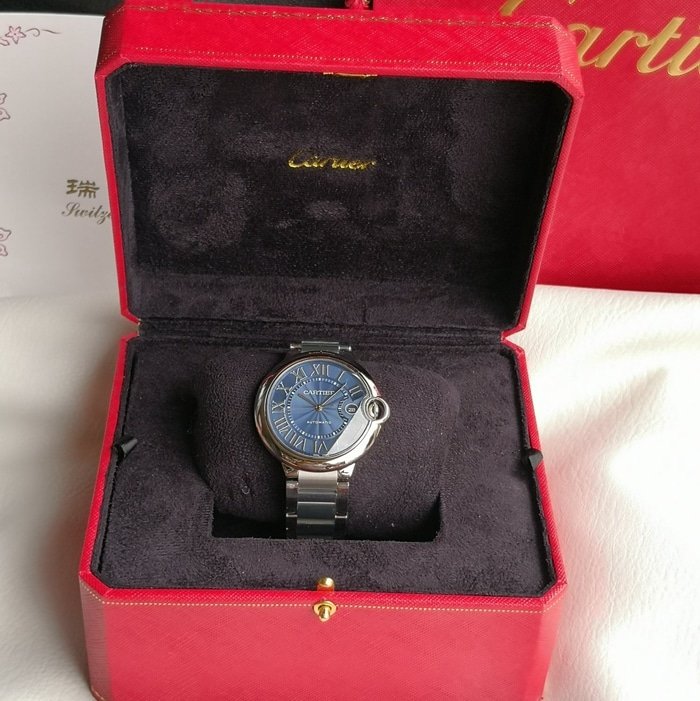 top-tier replica watch Cartier men's blue dial blue balloon series steel bracelet watch front view