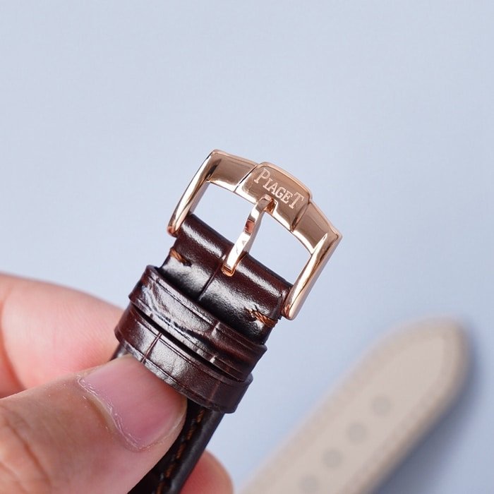 Top-tier replica watch Piaget men's white dial dragon and phoenix series leather strap watch clasp picture
