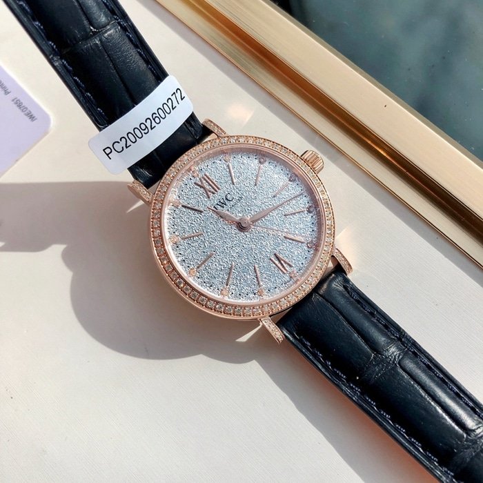 top-tier replica watch IWC women's white dial Portofino mechanical leather strap watch front view
