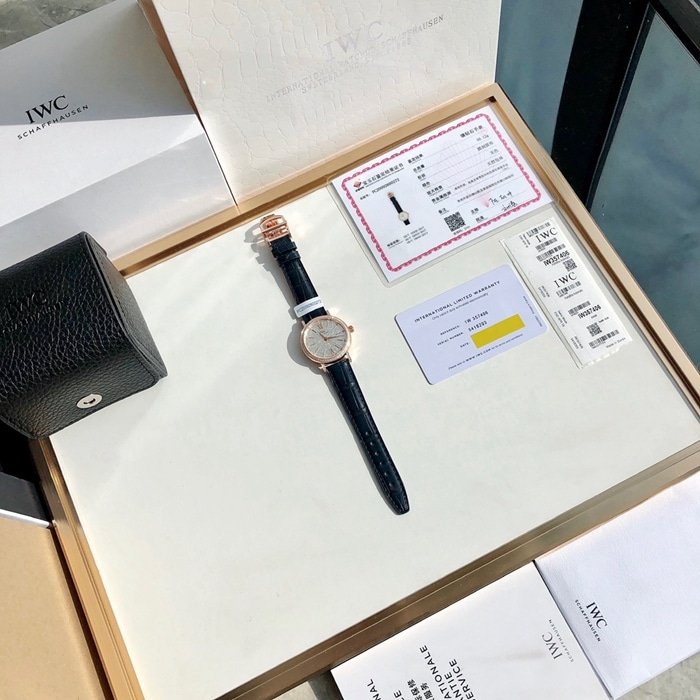 top-tier replica watch IWC women's white dial Portofino mechanical leather strap watch front view