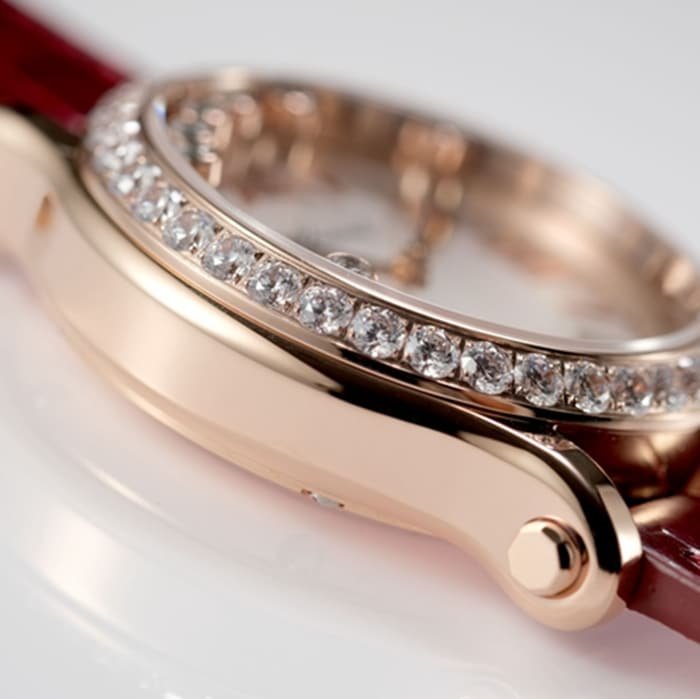top-tier replica watch Chopard women's white dial red band HAPPY DIAMONDS series mechanical watch side view