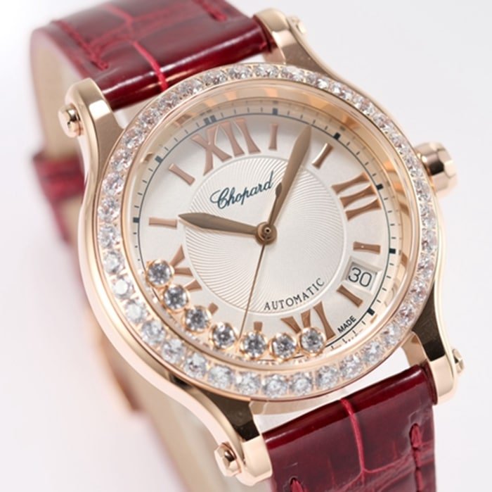 Top-tier replica watch Chopard women's white dial red band HAPPY DIAMONDS series mechanical watch front view