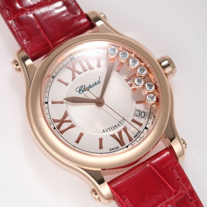 top-tier replica watch Chopard women's white dial red band happy diamond series leather strap watch front view