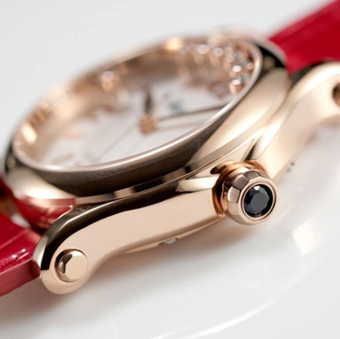 Top-tier replica watch Chopard women's white dial red band happy diamond series leather strap watch side view