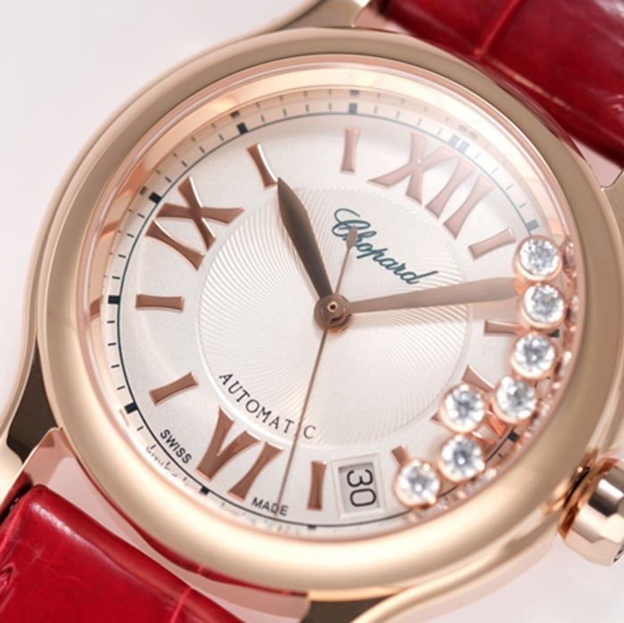 top-tier replica watch Chopard women's white dial red band happy diamond series leather strap watch front view