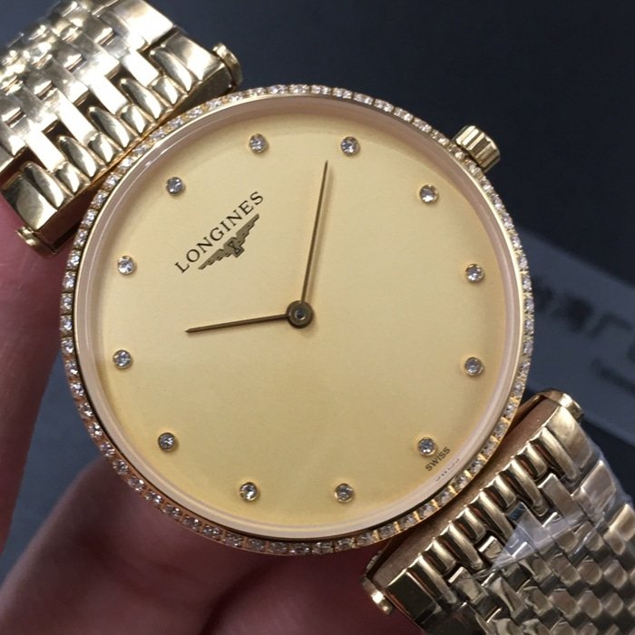 top-tier replica watch Longines couple watch gold plate gold belt Jialan series quartzsteel bracelet watch front view