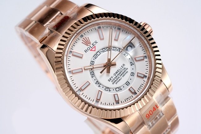 Top replica Rolex men's watch, white dial, rose gold, with the Explorer II series mechanical watch, front view.