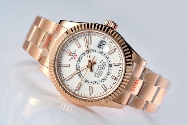 Top replica Rolex men's watch, white dial, rose gold, with the Explorer II series mechanical watch, front view.