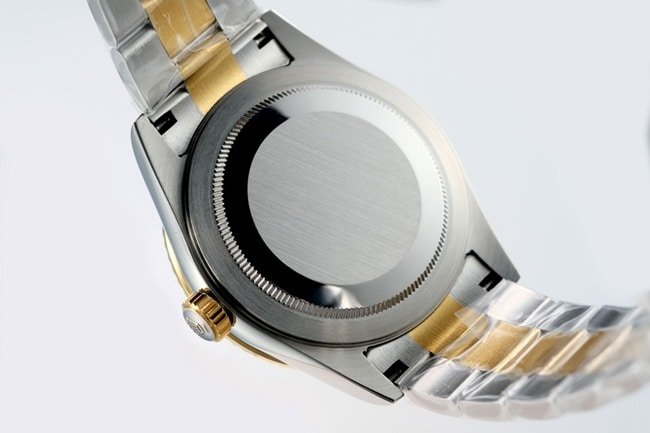 Top-tier replica Rolex men's black dial gold belt Navigator series automatic movement watch back cover picture