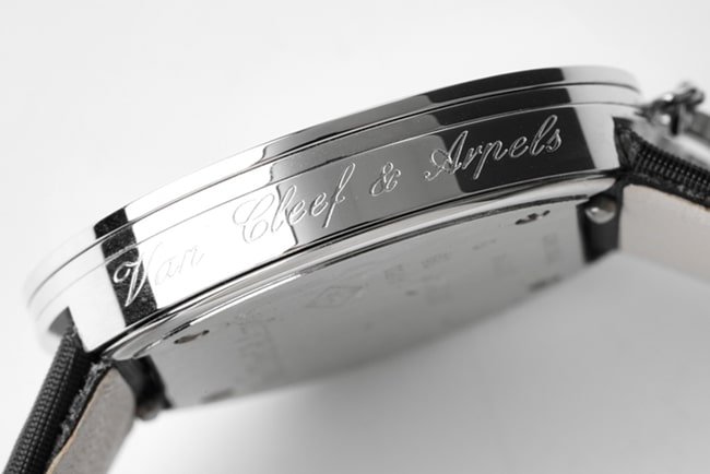 top-tier replica Van Cleef & Arpels women's white dial black belt quartzleather strap watch side view