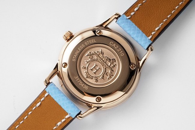 Top-tier replica Hermes Slim d’Hermes women’s white dial blue band quartzleather strap watch back cover picture