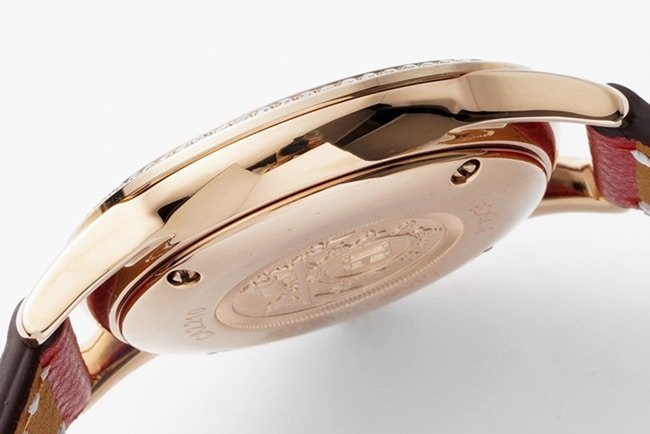 top-tier replica Hermes Slim d’Hermes women’s white dial blue band quartzleather strap watch side view