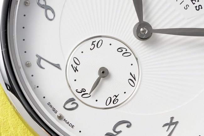 top-tier replica Hermès women's white dial yellow belt classic series quartzleather strap watch detail shots