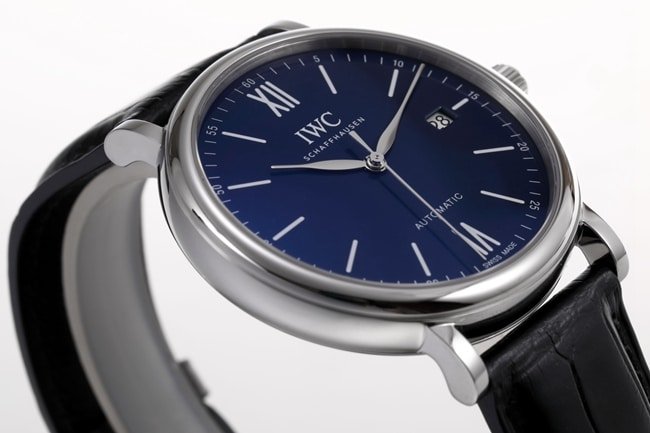 V7 factory top-tier replicaIWC high-quality replica watch men's blue dial black belt wave Fino series automatic movementleather strap watch side view