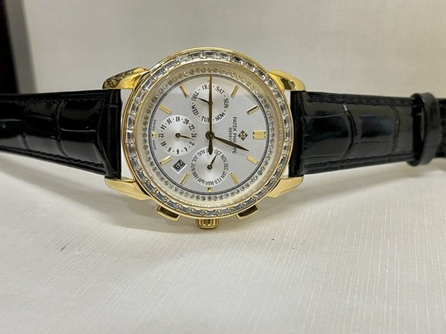 top-tier replica watch Patek Philippe women's white dial black belt complex chronograph function series leather strap watch front view