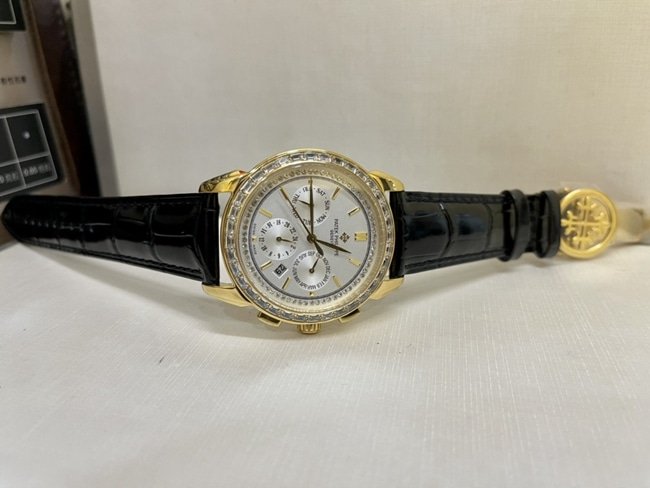 top-tier replica watch Patek Philippe women's white dial black belt complex chronograph function series leather strap watch front view