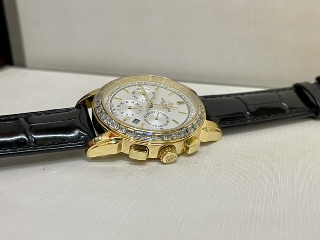 top-tier replica watch Patek Philippe women's white dial black belt complex chronograph function series leather strap watch side view