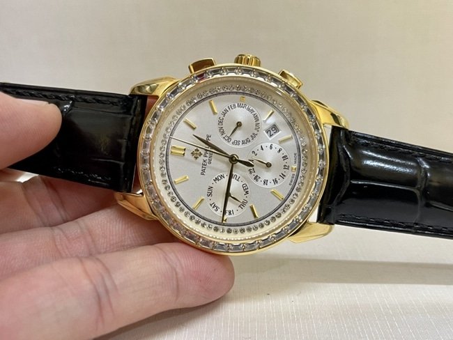 top-tier replica watch Patek Philippe women's white dial black belt complex chronograph function series leather strap watch front view