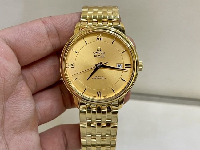 top-tier replica watch Omega men's gold plate gold steel bracelet Die Fei series 41mm natural real diamond mechanical watch front view