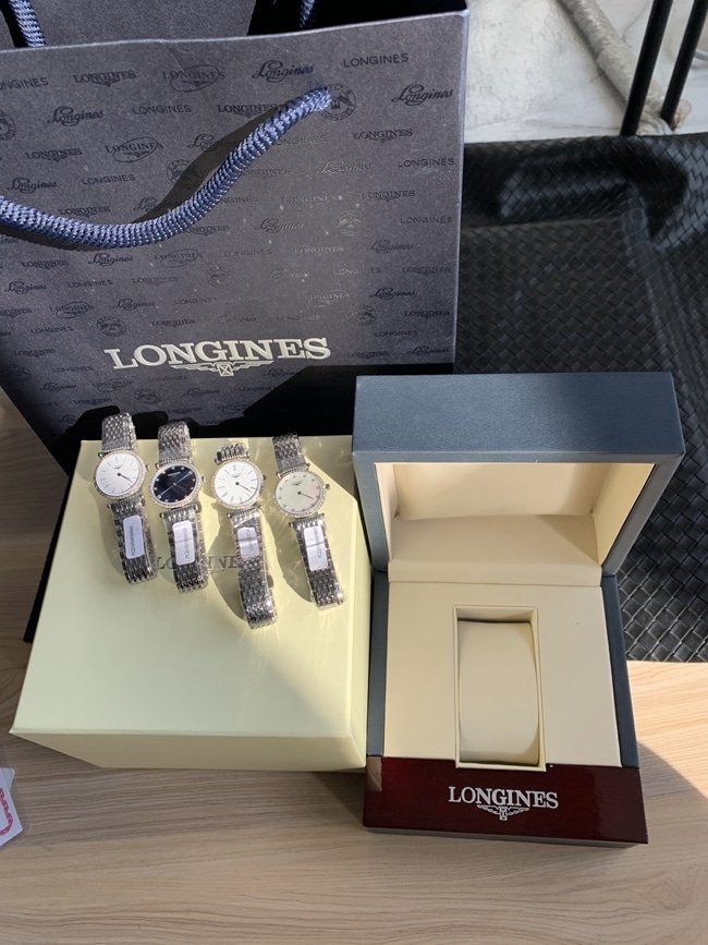 top-tier replica watch Longines women's white dialsteel bracelet casual fashion quartz Jialan series watch front view