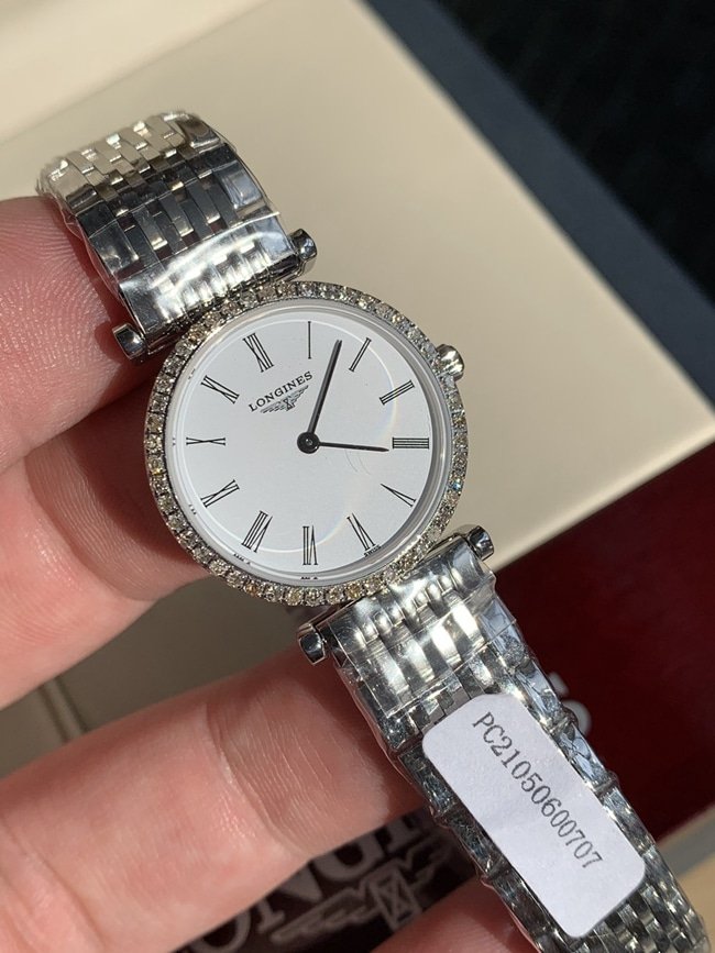 Top-Replika-Uhren von Longines für Damen, weiße Platte, Stahlarmband, lässige Mode, Quarzuhren der Jialan-Serie — luxury replica watch guide | Watch Replica Expert
