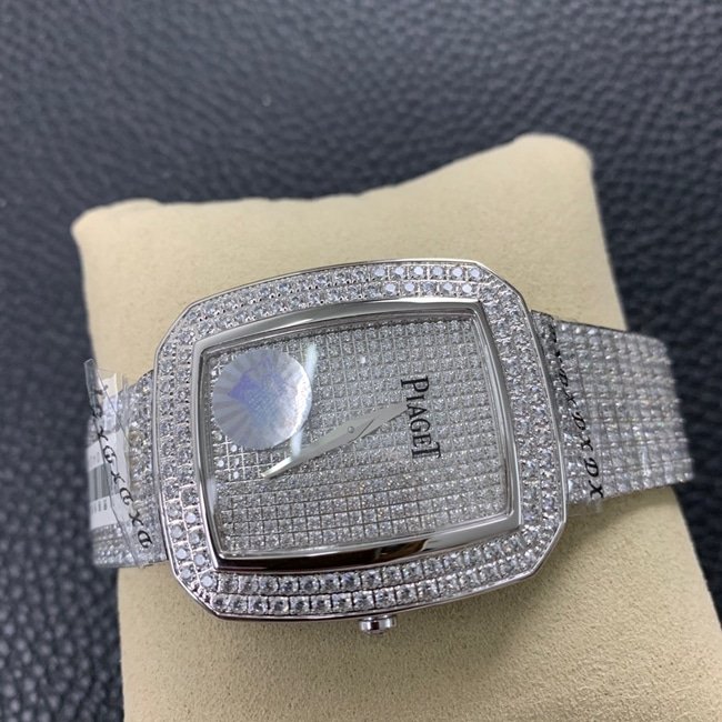Top replica Piaget women's watch, white dial, steel strap, Extraordinary Treasures collection, full diamond watch, front view.