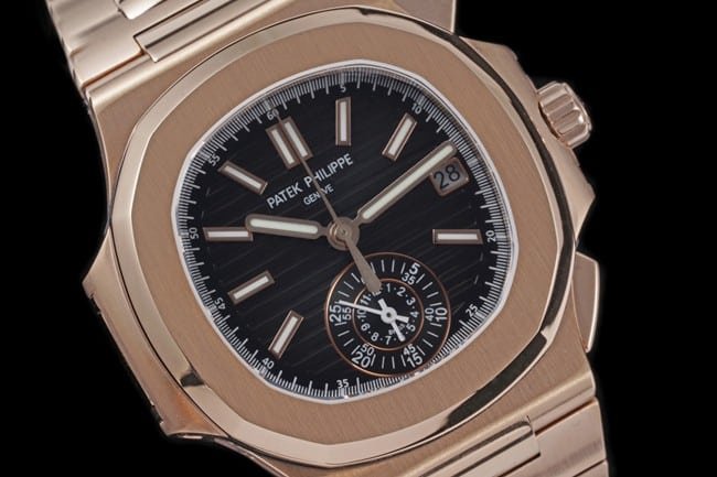 Patek Philippetop-tier replica watch multifunctional chronograph men's black dialsteel braceletNautilus series watch front view