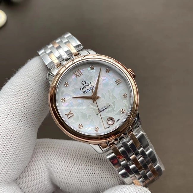 Top replica watch Omega De Ville series women's white dial two-tone metal bracelet mechanical watch front view