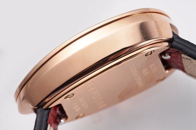 BV factory top-tier replica watch Bvlgari women's red plate red strap Serpenti series quartzleather strap watch side view