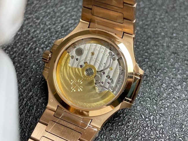 3K Factorytop-tier replica watch Patek Philippe women's white dialsteel braceletNautilus series automatic movement watch movement picture