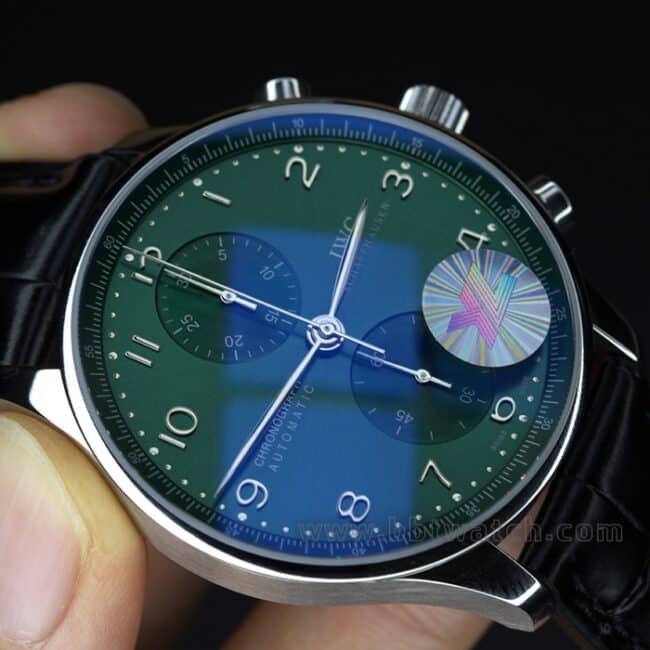 YL factory top-tier replica watch IWC green Portuguese watch 150th anniversary commemorative model men's green dial black belt full automatic movement see-through bottom leather strap watch side view