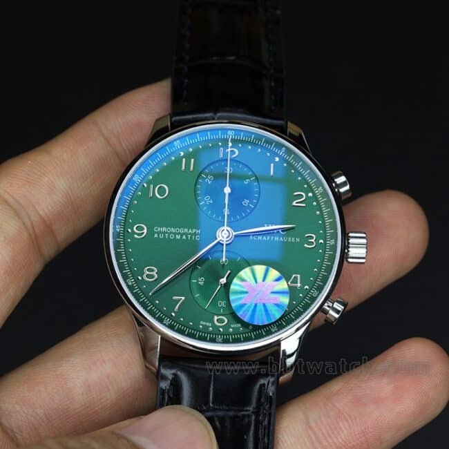 YL factory top-tier replica watch IWC green Portuguese watch 150th anniversary commemorative model men's green dial black belt full automatic movement see-through bottom leather strap watch front view