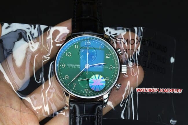 YL factory top-tier replica watch IWC green Portuguese watch 150th anniversary commemorative model men's green dial black belt full automatic movement see-through bottom leather strap watch front view