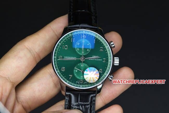YL factory top-tier replica watch IWC green Portuguese watch 150th anniversary commemorative model men's green dial black belt full automatic movement see-through bottom leather strap watch front view