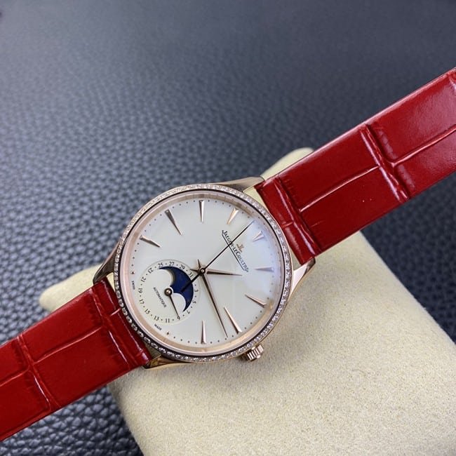 Jaeger-LeCoultretop-tier replica watch ladies white dial red dot moon phase master automatic movementleather strap front view