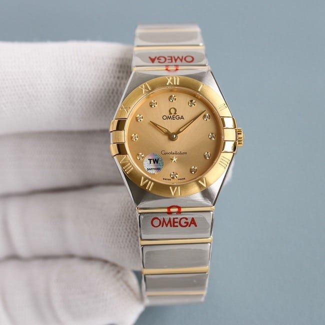 TW Factory Omega Constellation Ladies 1:1 Réplica, mostrador Champagne Sunray com marcadores de diamante, pulseira de aço dourado 131.20.28.60.58.001 — luxury replica watch guide | Watch Replica Expert